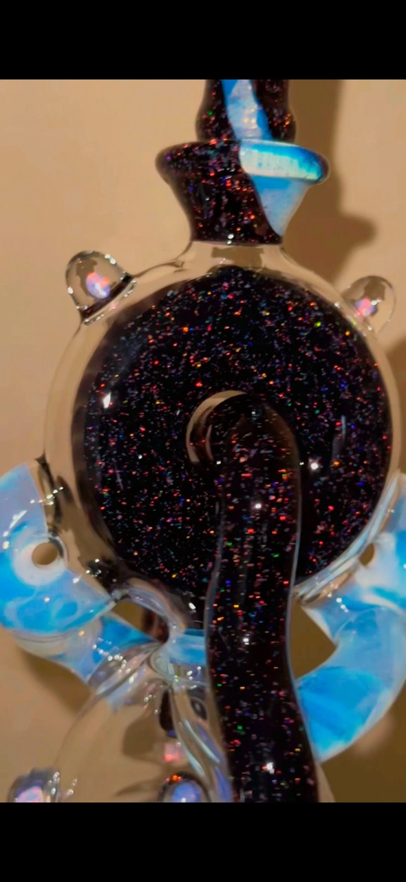 Masterfully sculpted glass that tells a story of creativity.